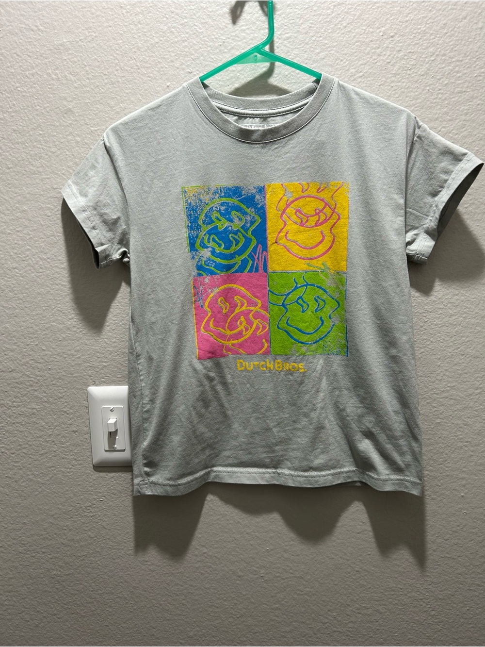Dutch Bros Light Gray Tee with Blue, Yellow, Pink, Green Quad Smiley Fac Graphic